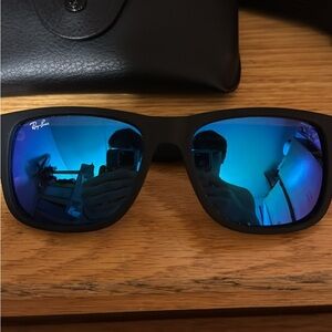 Ray-Ban Black Frames with Vibrant Blue Lenses
